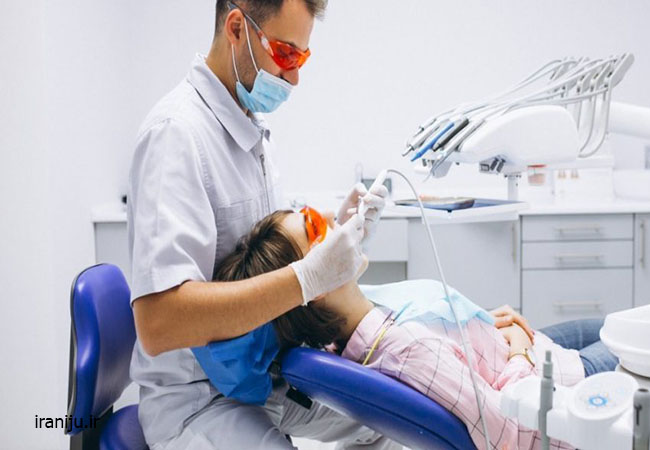 معاینه توسط دندانپزشک عمومی